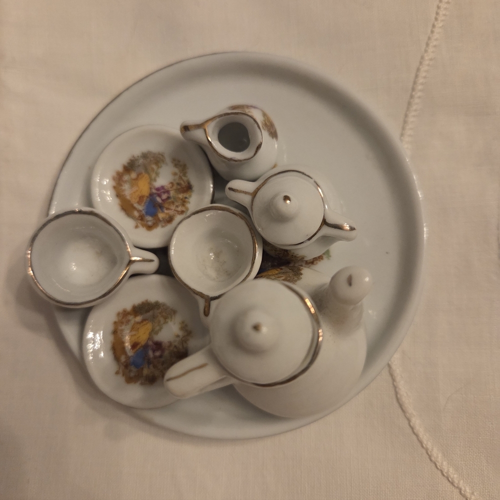 Vintage Miniature Porcelain 10 pc Tea Set Faux Gold Couple W Woman On Swing.